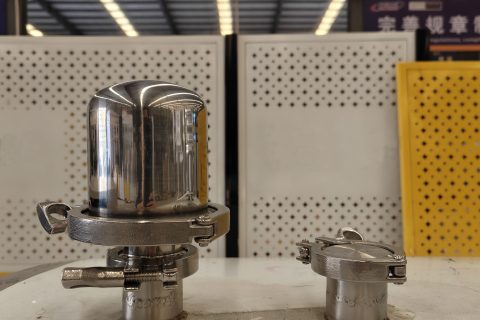 Milk cooling tank vent and sanitary port